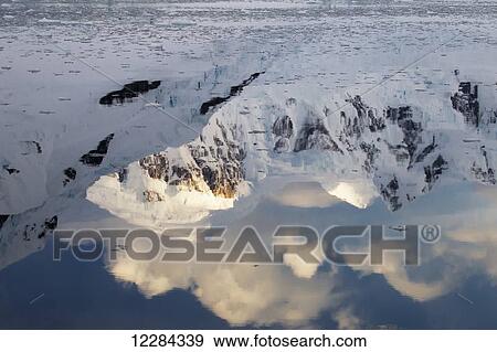 Sun on mountains in Paradise Harbor, Antarctic Peninsula; Antarctica View Large Photo Image Stock Photo - Sun on mountains in Paradise Harbor, Antarctic Peninsula; Antarctica. Fotosearch