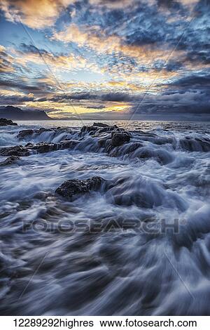 Sunrise colours the skies above the coastline of Iceland, Snaefellsness Peninsula; Iceland View Large Photo Image Stock Photograph - Sunrise colours the skies above the coastline of Iceland, Snaefellsness Peninsula; Iceland. Fotosearch