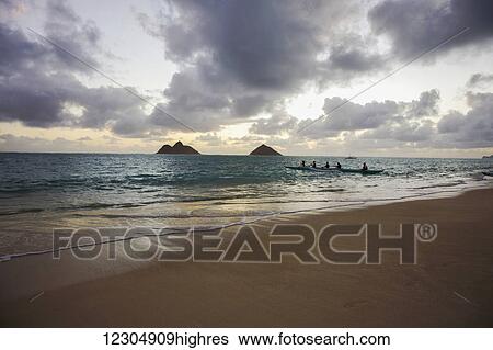 Sunrise paddling at Lanikai Beach; Oahu, Hawaii, United States of America View Large Photo Image Stock Photograph - Sunrise paddling at Lanikai Beach; Oahu, Hawaii, United States of America. Fotosearch