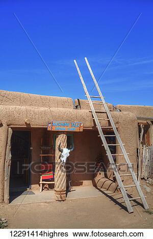 Stock Photograph - Taos Pueblo, dates to 1000 AD; New Mexico, United States of America. Fotosearch