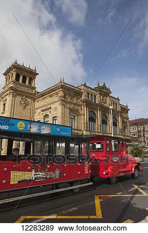 Teatro Victoria Eugenia theatre with a tourist tour bus in front; San Sebastian, Spain View Large Photo Image Stock Photo - Teatro Victoria Eugenia theatre with a tourist tour bus in front; San Sebastian, Spain. Fotosearch