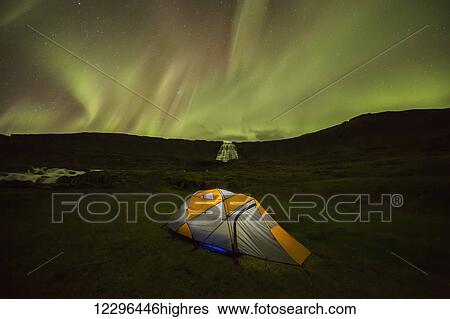 Tent lit up at night in front of the waterfall Dynjandi; West Fjords, Iceland View Large Photo Image Stock Photograph - Tent lit up at night in front of the waterfall Dynjandi; West Fjords, Iceland. Fotosearch