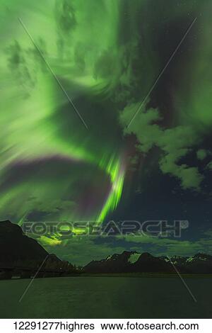 The aurora borealis above the Turnagain Arm south of Girdwood, Alaska. View Large Photo Image Stock Photograph - The aurora borealis above the Turnagain Arm south of Girdwood, Alaska.. Fotosearch
