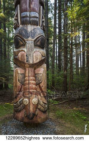 The Base of a large Totem Pole in Sitka National Historic Park, Sitka, Southeast Alaska, USA, Summer View Large Photo Image Stock Photograph - The Base of a large Totem Pole in Sitka National Historic Park, Sitka, Southeast Alaska, USA, Summer. Fotosearch