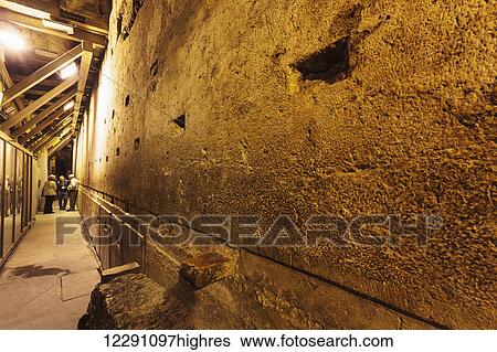 Stock Photograph - The biggest stone in the Western Wall, often called the Western Stone, revealed within the tunnel and ranks as one of the heaviest objects ever lifted by human beings without powered machinery; Jerusalem, Israel. Fotosearch