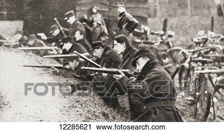 Stock Image - The famous motor cycle corps of LiÃƒÆ’Ã‚Â¨ge, Belgium defend a farm from the advancing Germans in 1914. From The Pageant of the Century, published 1934. Fotosearch