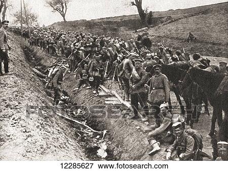 Stock Photo - The German army, the Grey Invaders, resting in a sunken road during WWI. From The Pageant of the Century, published 1934. Fotosearch