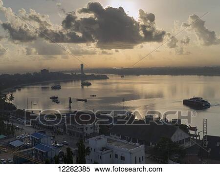 The harbour at sunset; Dar es Salaam, Tanzania View Large Photo Image Stock Photography - The harbour at sunset; Dar es Salaam, Tanzania. Fotosearch