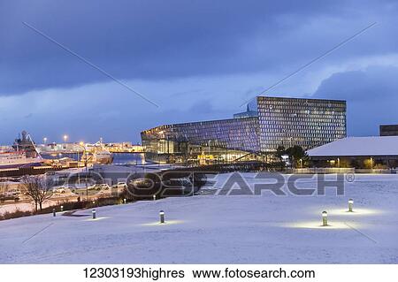The Harpa Public Concert Hall as seen from Arnarholl Park, designed by Danish firm Henning Larsen Architects and Icelandic firm Batteriao Architects, the glass facade was designed by Icelandic glass artist Olafur Eliasson, a snowy field in the... View Large Photo Image Stock Photograph - The Harpa Public Concert Hall as seen from Arnarholl Park, designed by Danish firm Henning Larsen Architects and Icelandic firm Batteriao Architects, the glass facade was designed by Icelandic glass artist Olafur Eliasson, a snowy field in the.... Fotosearch