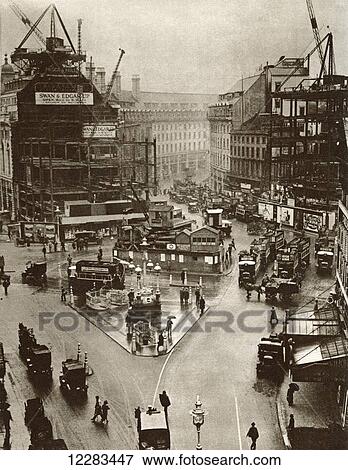 The introduction of the roundabout system in Piccadilly Circus, London, England in 1926. From The Story of 25 Eventful Years in Pictures published 1935 View Large Photo Image Stock Photo - The introduction of the roundabout system in Piccadilly Circus, London, England in 1926. From The Story of 25 Eventful Years in Pictures published 1935. Fotosearch
