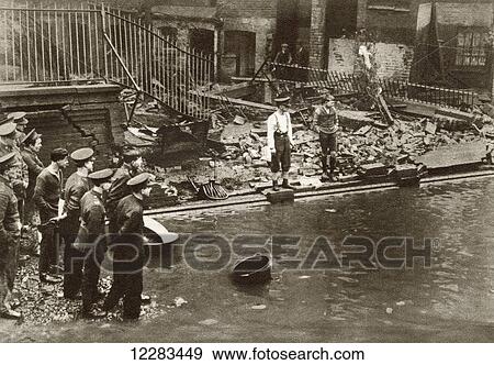 The London flood of 1928. A scene showing damage caused when the Westminster Embankment gave way. From The Story of 25 Eventful Years in Pictures published 1935 View Large Photo Image Stock Photo - The London flood of 1928. A scene showing damage caused when the Westminster Embankment gave way. From The Story of 25 Eventful Years in Pictures published 1935. Fotosearch