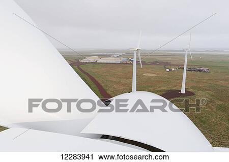 The nose cone of a rotor of a wind turbine as viewed from atop the Nacelle wind turbine, St. Paul Island, Southwestern Alaska, USA, Summer View Large Photo Image Stock Image - The nose cone of a rotor of a wind turbine as viewed from atop the Nacelle wind turbine, St. Paul Island, Southwestern Alaska, USA, Summer . Fotosearch