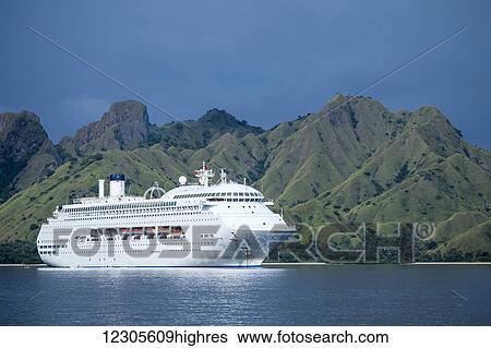 The Pacific Jewel off Komodo Island, a cruise ship operated by the P&O cruise line, holding up to 1, 950 guests and has 11 guest decks; Flores, Indonesia View Large Photo Image Stock Photograph - The Pacific Jewel off Komodo Island, a cruise ship operated by the P&O cruise line, holding up to 1, 950 guests and has 11 guest decks; Flores, Indonesia. Fotosearch