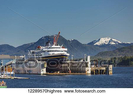 Stock Photograph - The Taku passenger ferry docked in the Ketchikan shipyard for repairs, Ketchikan, Southeast Alaska, USA, Spring. Fotosearch