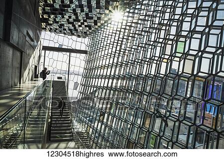 Stock Photograph - The unique designs of the Harpa concert hall and conference centre is free and open for all to experience and view; Reykjavik, Iceland. Fotosearch