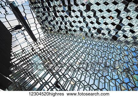 The unique designs of the Harpa concert hall and conference centre is free and open for all to experience and view; Reykjavik, Iceland View Large Photo Image Stock Photograph - The unique designs of the Harpa concert hall and conference centre is free and open for all to experience and view; Reykjavik, Iceland. Fotosearch