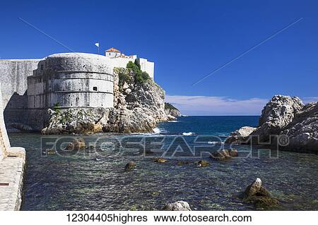 The Walls of Dubrovnik surround the old city of Dubrovnik and provide stunning scenery and vantage points around the city; Dubrovnik, Croatia View Large Photo Image Stock Photograph - The Walls of Dubrovnik surround the old city of Dubrovnik and provide stunning scenery and vantage points around the city; Dubrovnik, Croatia. Fotosearch