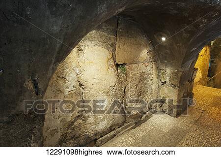 Stock Photograph - The Western Wall Tunnel, an underground tunnel exposing the full length of the Western Wall; Jerusalem, Israel. Fotosearch
