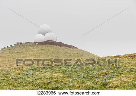 Three radar domes sit atop a green tundra hillside, St. Paul Island, Southwestern Alaska, USA, Summer View Large Photo Image Stock Photograph - Three radar domes sit atop a green tundra hillside, St. Paul Island, Southwestern Alaska, USA, Summer . Fotosearch