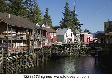 Stock Photograph - Tourist shops and homes along Creek Street in downtown Ketchikan, Southeast Alaska, USA, Spring. Fotosearch
