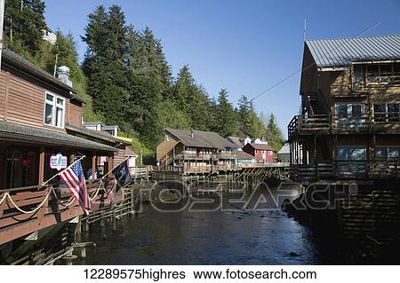 Stock Photograph - Tourist shops and homes along Creek Street in downtown Ketchikan, Southeast Alaska, USA, Spring. Fotosearch