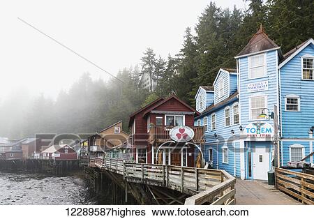 Stock Photograph - Tourist shops and homes along Creek Street in downtown Ketchikan, Southeast Alaska, USA, Spring. Fotosearch