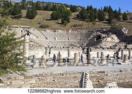 Stock Photograph - Tourists at a theatre built in the second century; Ephesus, Izmir, Turkey. Fotosearch