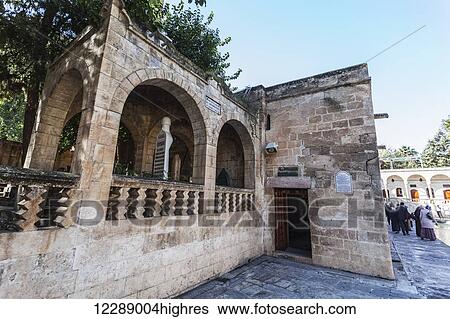 Stock Photograph - Tourists at Chamber of Abraham; Sanliurfa, Turkey. Fotosearch