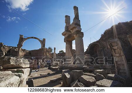 Stock Photograph - Tourists at ruins of the Temple of Domitian; Ephesus, Izmir, Turkey. Fotosearch