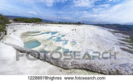 Tourists at the mineral rich pools and hot springs; Pamukkale, Turkey View Large Photo Image Stock Photograph - Tourists at the mineral rich pools and hot springs; Pamukkale, Turkey. Fotosearch