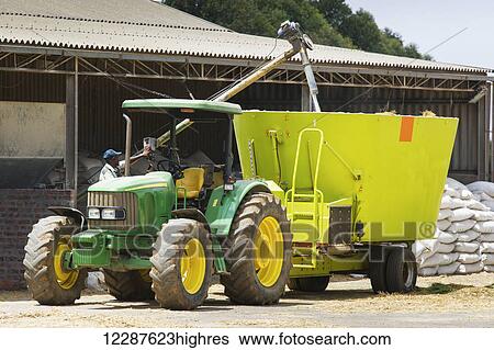 Stock Photograph - Tractor on a farm; Cullinan, Gautang, South Africa. Fotosearch