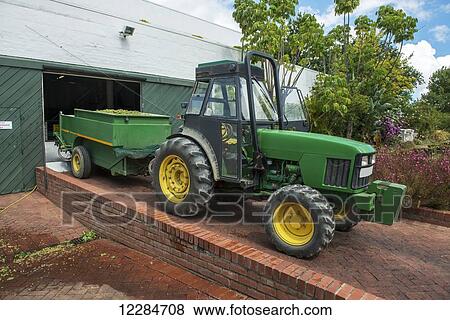 Tractor on a farm; Cullinan, Gauteng, South Africa View Large Photo Image Stock Photo - Tractor on a farm; Cullinan, Gauteng, South Africa. Fotosearch