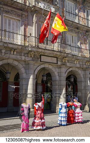 Traditional dresses on mannequins in Plaza Mayor; Madrid, Spain View Large Photo Image Stock Photograph - Traditional dresses on mannequins in Plaza Mayor; Madrid, Spain. Fotosearch
