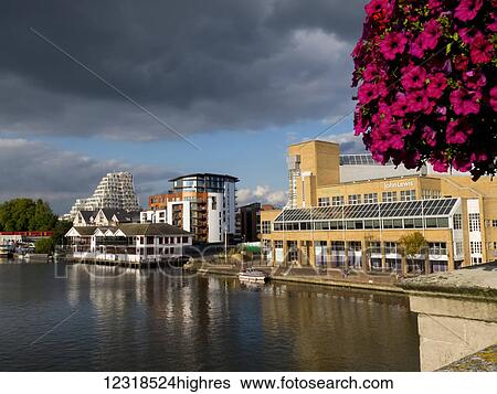 Stock Photograph - Tranquil river scene at Kingston upon Thames; Surrey, England. Fotosearch