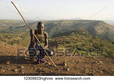 Stock Photograph - Tribesman in Omo Valley; Ethiopia. Fotosearch