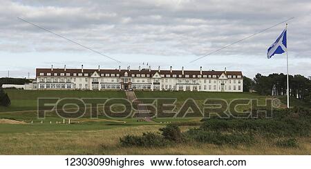 Stock Photograph - Turnberry Hotel at Trump Turnberry golf course along the coast; Turnberry, Scotland. Fotosearch