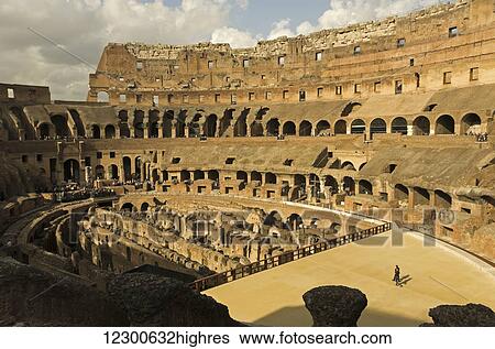 Two women walk toward edge of platform in the Colosseum; Rome, Italy View Large Photo Image Stock Photograph - Two women walk toward edge of platform in the Colosseum; Rome, Italy. Fotosearch
