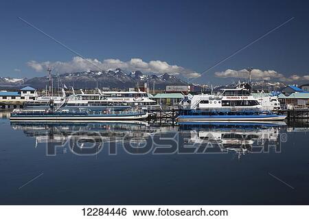 Ushuaia, regarded as the most Southern city in the world; Ushuaia, Tierra del Fuego, Argentina View Large Photo Image Stock Photograph - Ushuaia, regarded as the most Southern city in the world; Ushuaia, Tierra del Fuego, Argentina. Fotosearch