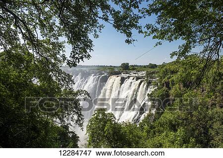 Victoria Falls waterfall; Livingstone, Zambia View Large Photo Image Stock Photo - Victoria Falls waterfall; Livingstone, Zambia. Fotosearch