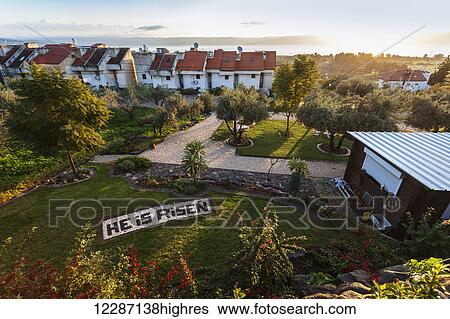 Stock Photograph - View from the balcony of the Beit Bracha guest house, with the Sea of Galilee and Golan Hight's in the distance; Migdal, Israel. Fotosearch
