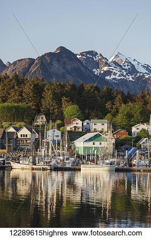 View of boats in Sitka Harbor and homes and the Sisters Mountains in the background, Sitka, Southeast Alaska, summer View Large Photo Image Stock Photograph - View of boats in Sitka Harbor and homes and the Sisters Mountains in the background, Sitka, Southeast Alaska, summer. Fotosearch