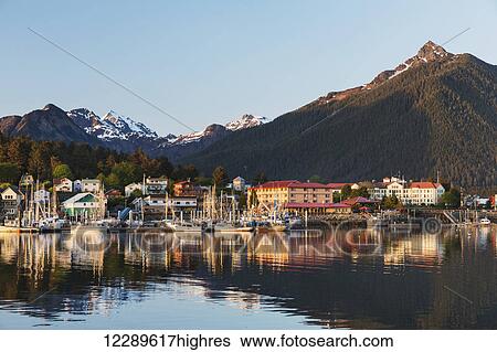 View of boats in Sitka Harbor and homes and the Sisters Mountains in the background, Sitka, Southeast Alaska, summer View Large Photo Image Stock Photograph - View of boats in Sitka Harbor and homes and the Sisters Mountains in the background, Sitka, Southeast Alaska, summer. Fotosearch