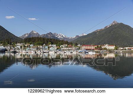 View of boats in Sitka Harbor and homes and the Sisters Mountains in the background, Sitka, Southeast Alaska, summer View Large Photo Image Stock Photograph - View of boats in Sitka Harbor and homes and the Sisters Mountains in the background, Sitka, Southeast Alaska, summer. Fotosearch
