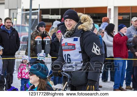 Stock Photograph - View of Dallas Seavey at the cermonial start of the 2016 Iditarod Dog Sled Race in downtown Anchorage, Alaska, USA, Winter.. Fotosearch