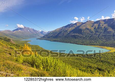 Stock Photograph - View of Eklutna Lake and the Chugach Mountains from the Twin Peaks Trail, Chugach State Park, Southcentral Alaska, Summer. Fotosearch