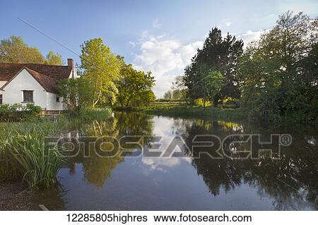View of Flatford Mill, where John Constable painted the famous picture, The Haywain; Flatford Mill, Suffolk, England View Large Photo Image Stock Photograph - View of Flatford Mill, where John Constable painted the famous picture, The Haywain; Flatford Mill, Suffolk, England. Fotosearch