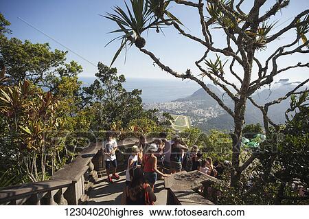 Stock Photograph - View of Jockey Club and Leblon from Christ the Redeemer statue, Corcovado mountain, Tijaca National Park; Rio de Janeiro, Brazil. Fotosearch