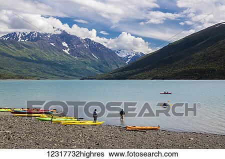 Stock Photograph - View of kayaks on Eklutna Lake in Chugach State Park, Alaska, Summer, USA.. Fotosearch