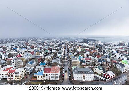 Stock Photograph - View of Reykjavik from the top of the Hallgrimskirkja in winter; Reykjavik, Iceland. Fotosearch