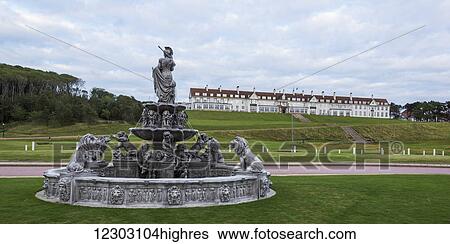 Water fountain and Turnberry Hotel at Trump Turnberry golf resort; Turnberry, Scotland View Large Photo Image Stock Photograph - Water fountain and Turnberry Hotel at Trump Turnberry golf resort; Turnberry, Scotland. Fotosearch